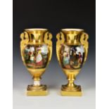 An impressive pair of Paris porcelain gold ground vases, early 19th century, in the Empire style,