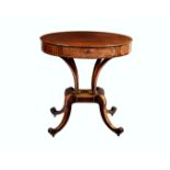 A Regency mahogany oval 'drum-top' centre table, with boxwood stringing and rosewood cross banding