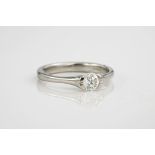 A platinum and brilliant cut diamond ring., The diamond totalling 0.43ct and in a tension setting,