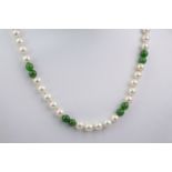 A 9ct gold, cultured pearl and jade necklace, each round pearl and jade bead measuring approximately