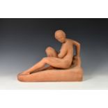 A terracotta model study of a female nude, first half 20th century, seated upon a rocky outcrop,