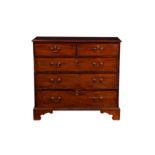 A George III mahogany straight front chest of drawers, the moulded top over two short and three long