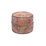 A circular paisley upholstered pouffe, modern, 17½in. (44.5cm.) diameter, 14in. (35.5cm.) high.