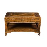 An Oriental carved wooden coffee table, 1950s-60s, of camphorwood chest style, the hinged,