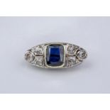 A 1920s platinum, 18ct gold, sapphire and diamond brooch, the brooch base of open frameworked