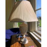 A classical style painted plaster vase lamp, with pleated silk shade, 28½in. (72.5cm.) high.