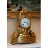 A 19th century French ormolu drum clock, the 8 day movement striking the hour and half hour on a