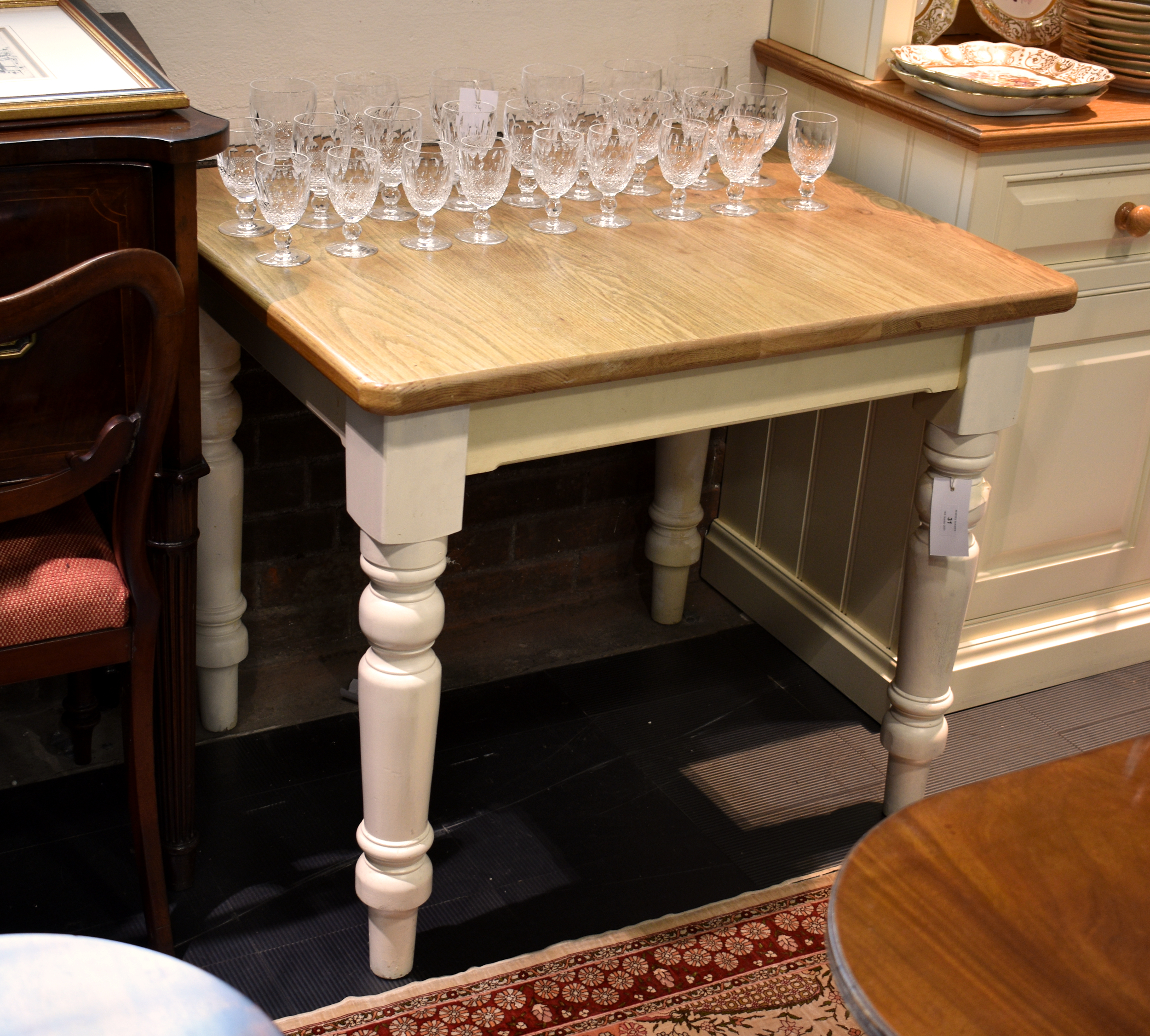 A painted pine and light oak kitchen table, 36 x 30in. (91.5 x 76.2cm.), 30in. (76.2cm.) high.