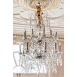 A Venetian style two tier eighteen light cut glass chandelier, first half 20th century, with