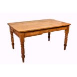A Victorian pine farmhouse table, the rectangular top with rounded corners, over a single full width
