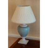 A set of three vase lamps, modern, the ovoid pottery lamps in ivory and pale green speckled glaze,