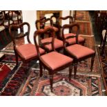 A harlequin set of five William IV rosewood and walnut dining chairs, comprising two pairs (one in