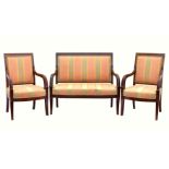 A French Empire style mahogany three piece salon suite, 20th century, comprising a two seater settee