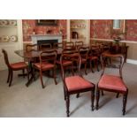 A closely matched set of ten William IV rosewood balloon back dining chairs, comprising a set of six