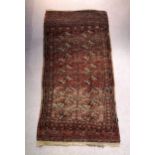 A small Tekke Bokhara rug, first half 20th century, 60 x 29in. (152.5 x 73.7cm.), worn.