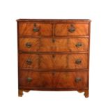 A mid-19th century cross banded mahogany bowfront chest, alterations, the well figured top over