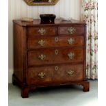 A Georgian walnut chest of drawers, probably originally the top of a chest on chest, adapted, the