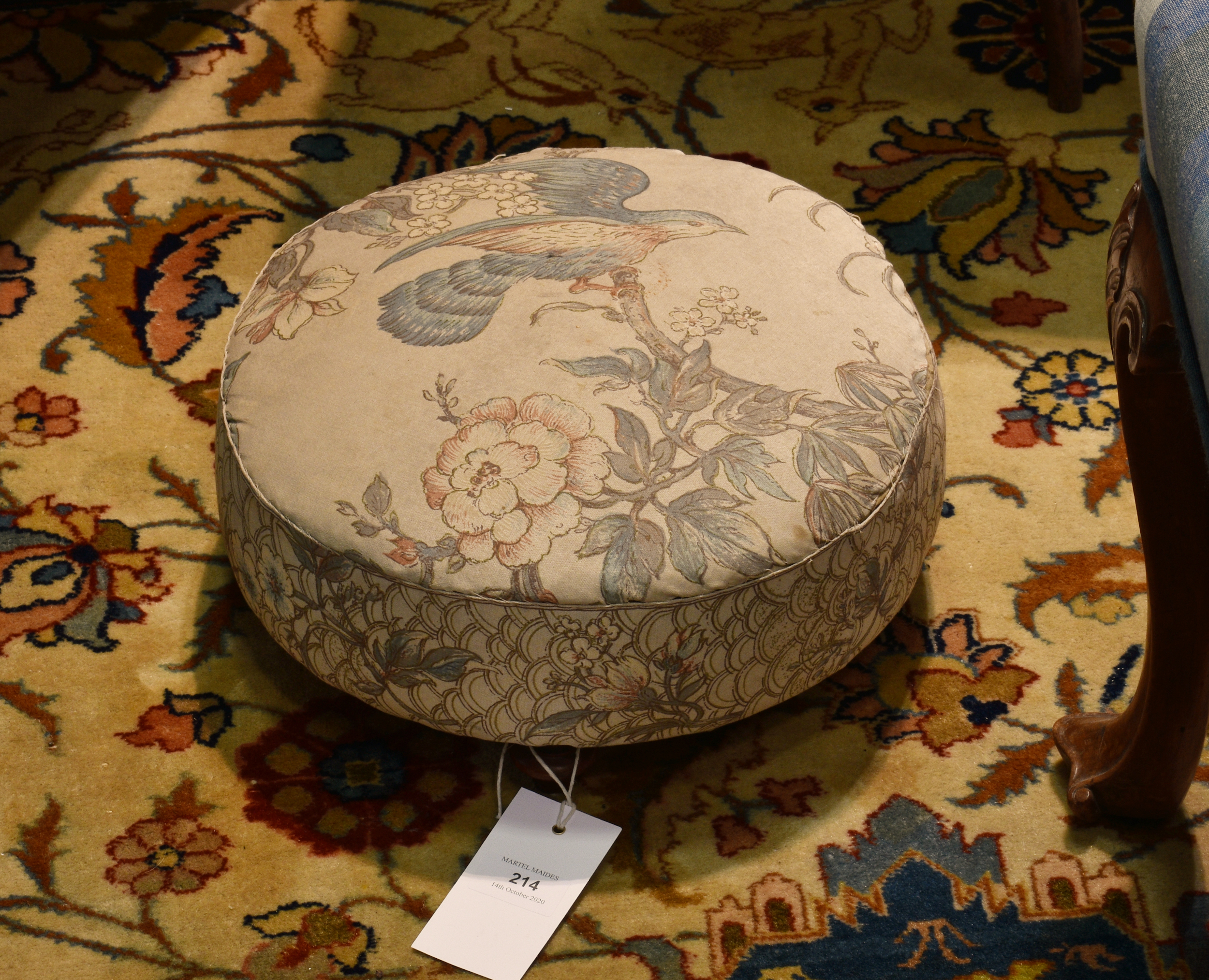 A Victorian circular footstool, 12½in. (32cm.) diameter.