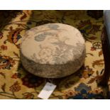 A Victorian circular footstool, 12½in. (32cm.) diameter.