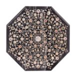 An Indian octagonal Pietra dura marble table top, the grey marble inlaid with extensive floral and