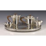 A vintage George VI silver Art Deco style four piece tea and coffee service, Edward Barnard & Sons