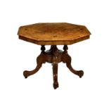 A Victorian octagonal walnut and marquetry low occasional table, the quarter veneered top raised