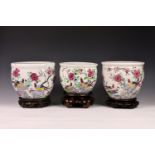 A matched graduated set of six Chinese famille rose porcelain jardinières, 19th century, of