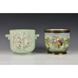 A Continental porcelain celadon glazed jardinière with white floral bocage, with twin angular