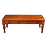 A Victorian mahogany low two drawer side table, probably reduced in height, the moulded