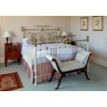 A Victorian brass and painted bedstead, extended to super king-size, with floral and shell