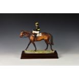 A Hereford Fine China for Birmingham Mint 'Mill Reef' porcelain race horse figurine, numbered 66/