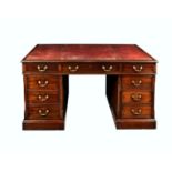 A good quality George III style mahogany double pedestal desk, late 20th century, the top with red