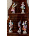 Five Meissen style porcelain figures of musicians, probably early 20th century, one with blue
