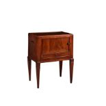 An Edwardian mahogany tambour front bedside cabinet, the rectangular top over a tambour door and