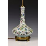 A Chinese famille rose porcelain bottle vase, converted to a lamp, 19th century, drilled, with