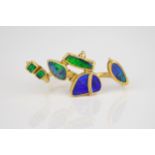 An unusual handmade 18ct yellow gold and black opal double shank ring, the two open shanks with