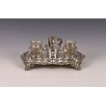 A William IV silver ink stand, Joseph Angell I & John Angell I, London 1832, the shaped stand with