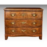 A Continental serpentine fronted three drawer commode, circa 1800, of small proportions, the moulded