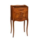 A French Louis XVI style marquetry bedside table, c.1900, the three quarter tray top with quarter