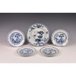 A set of four Chinese Kangxi period blue and white porcelain saucer dishes, painted with a central