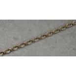 A 9ct gold fancy link bracelet, with sprung clasp, 7 5/8in. (19.3cm.) long.