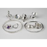 A small collection of silver jewellery, to include 8 rings and 2 bangles, the rings of various