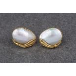 A pair of vintage 14ct gold and mabé pearl earrings, each pearl measuring 21x14mm and suspended in a