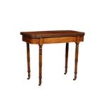 A late Regency mahogany D-shaped foldover tea table, the top with reeded edge, over a boxwood strung