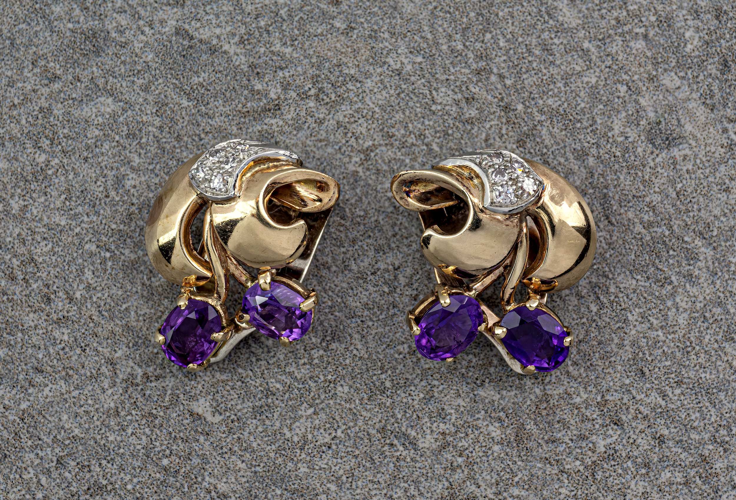 14ct yellow gold, amethyst and diamond ear clips, in a botanical design, each earring featuring 2