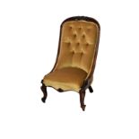 A Victorian rosewood framed buttoned chariot back nursing chair, the showframe with floral and