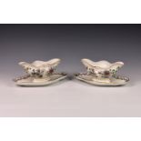 A pair of Meissen style porcelain sauce boats with integral underplates, c.1880, of navette form,