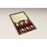 A cased set of silver Art Nouveau style floral coffee spoons, Joseph Rodgers & Sons, Sheffield 1918,