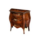 An early 19th century Italian bombe commode, of small proportions, the top and drawers decorated