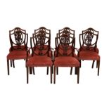A set of ten Hepplewhite style mahogany shield-back dining chairs., including a pair of carvers, the